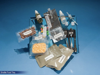 Illustration for article titled Take a photographic tour of NASA's space food through the decades